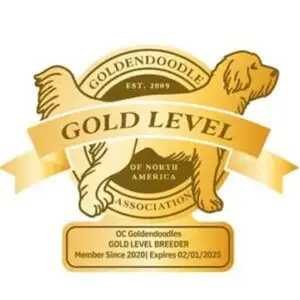 A gold level logo with a dog and ribbon.