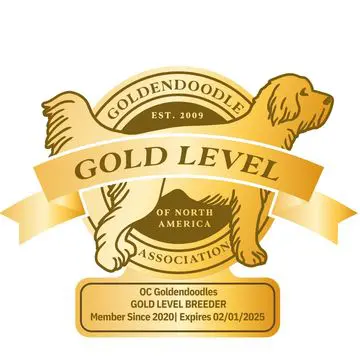 A gold level logo with a dog and ribbon.